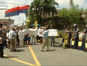 Piston transport group rallies at Times Street near President-elect Noynoy Aquino's house, June 18. Shot by Gani Taoatao